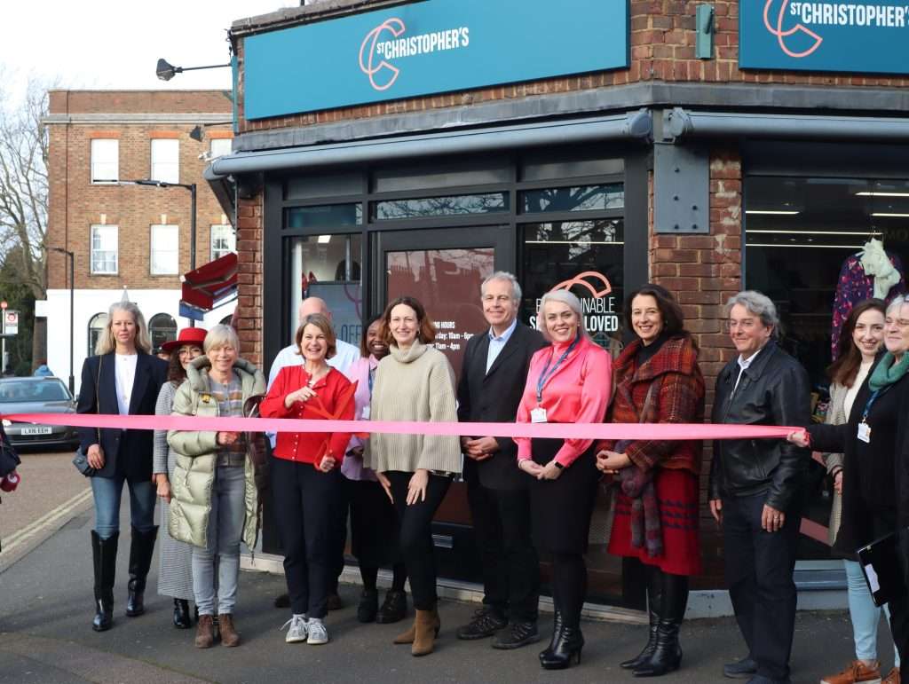 Helen Hayes cuts the ribbon with staff in West Dulwich