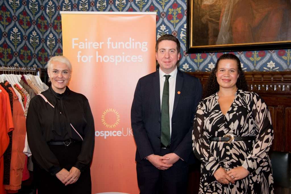 Eva and Liam Conlon with GInger at an event in parliament campaigning for better funding