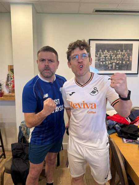 Two men in football clothes